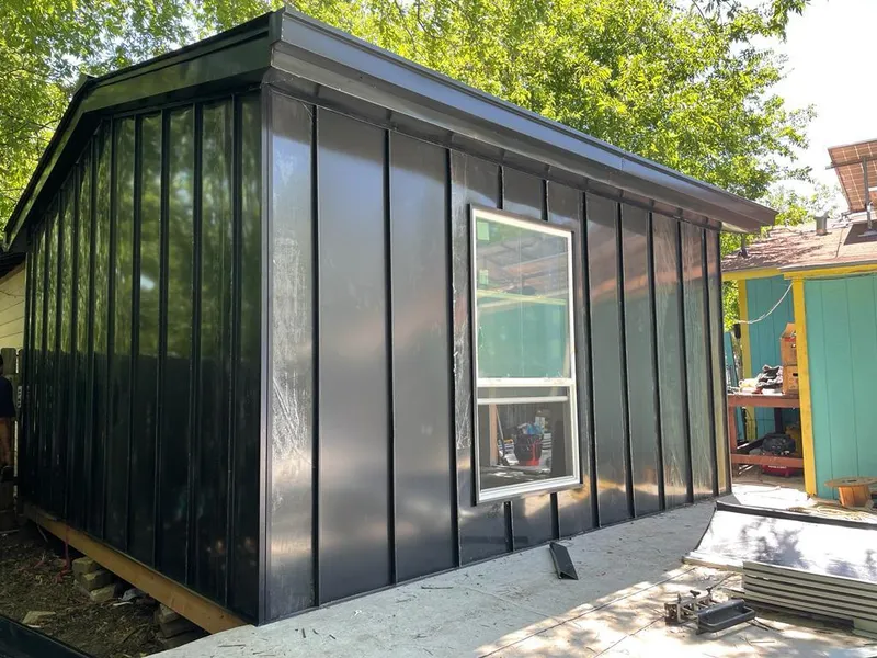 Black standing seam metal wall panels for Metal Roof Installation in Collegeville