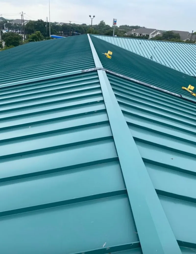 Green commercial metal roof ridge and valley for Metal Roof Repair in Collegeville