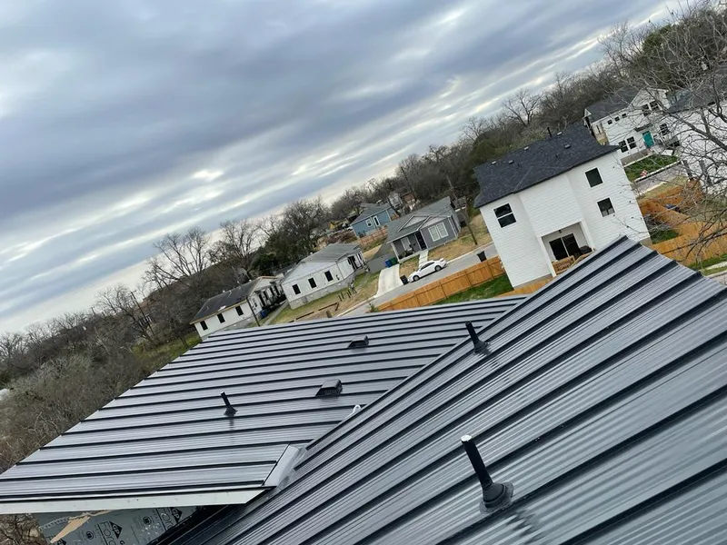 Standing seam metal roof panels with vents for Skylight Repair in Collegeville
